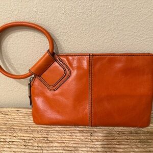 HOBO Vibrant Orange Leather Wristlet